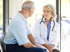 Elderly-male-patient-talkig-with-female-doctor-article.jpg