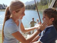 Mother-applying-sunscreen-to-son-article.jpg