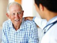 Old-man-smiling-with-doctor-article.jpg
