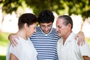 Grandson-praying-with-grandparents-article.jpg